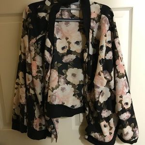 Stylish, slightly sheer jacket.  Never worn.